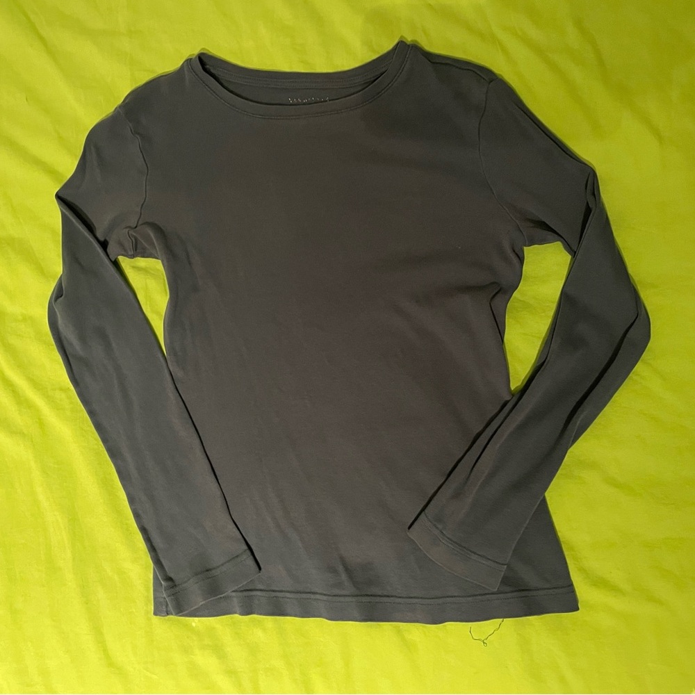 Blue tight fitting long sleeve shirt